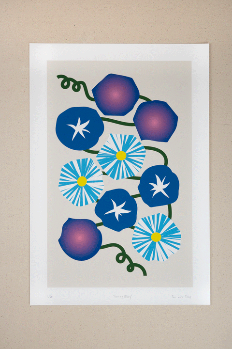 Blue and purple morning glory flowers with yellow and white accents on a green vine over an off-white background.