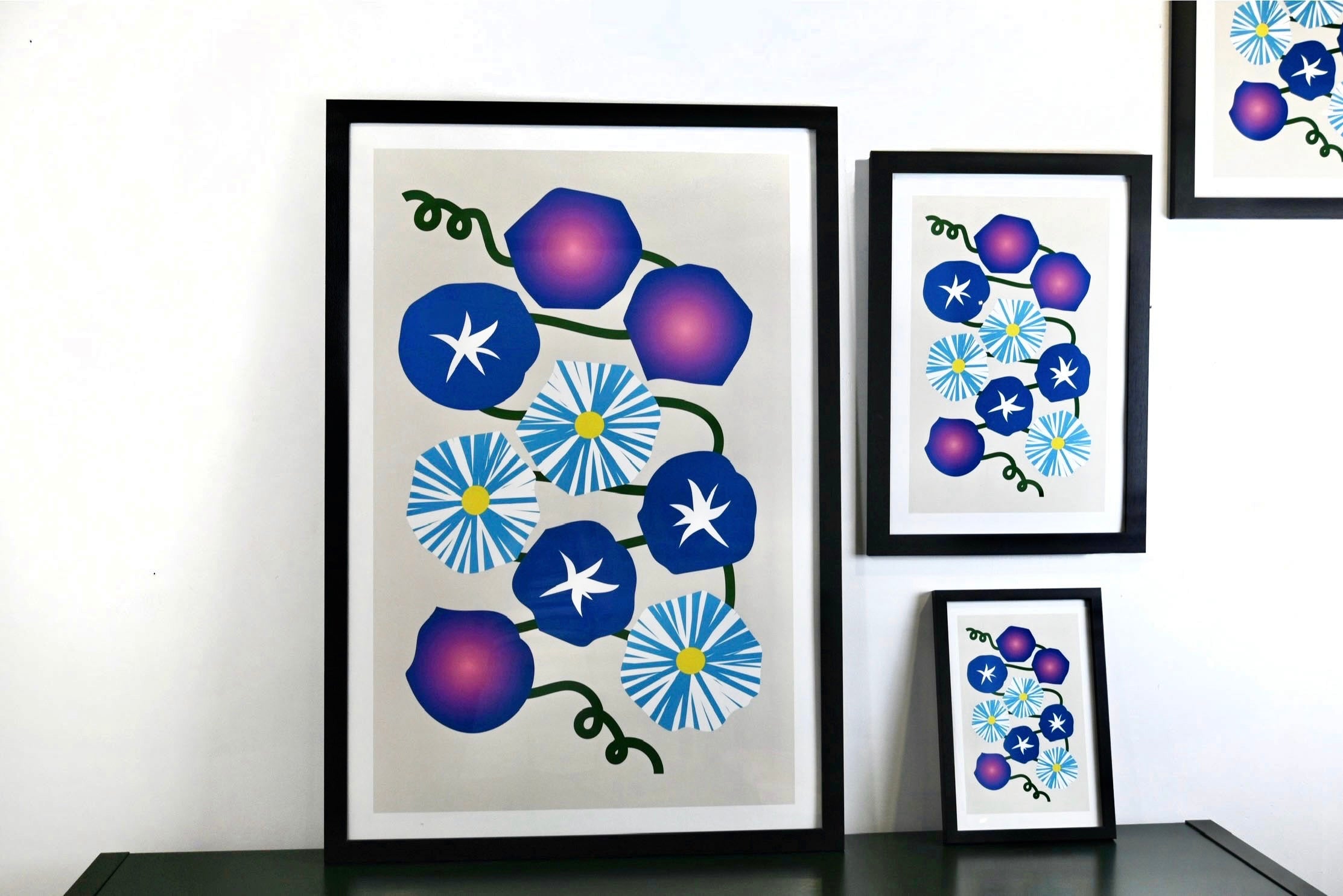 Colorful pile of contemporary art prints