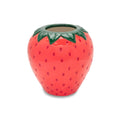 Ceramic strawberry-shaped vase on a white background