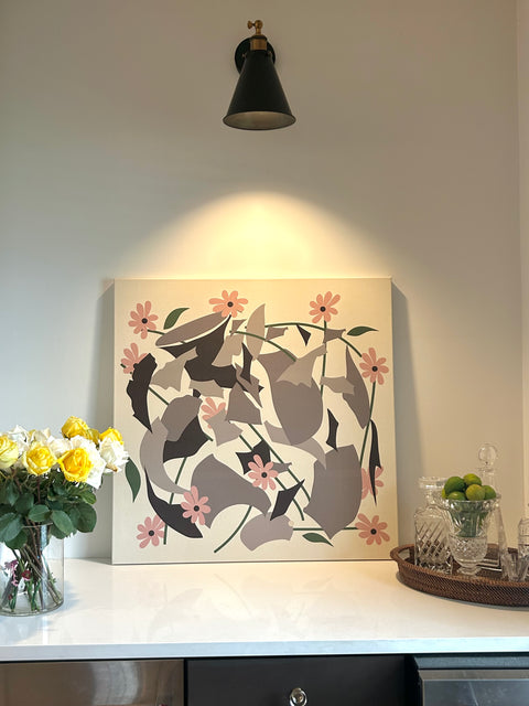 Abstract art print in sleek elegant home with white and black details