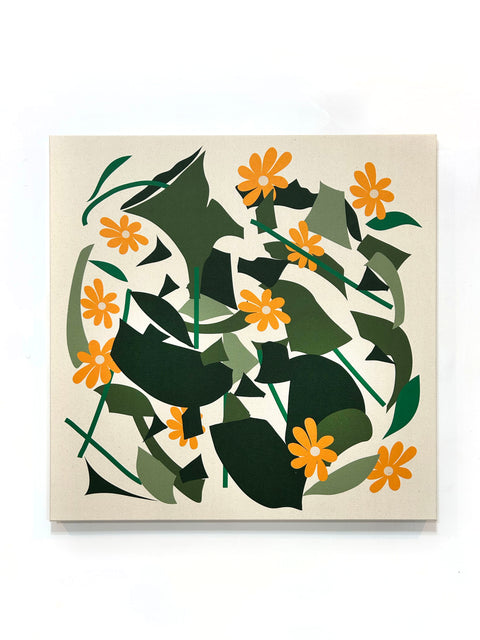 A canvas print featuring a geometric pattern with green shapes and orange flowers.