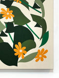 Close up of abstract floral and geometric design with shades of green, orange, and beige