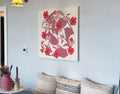 Canvas art piece with red, pink, and brown floral design