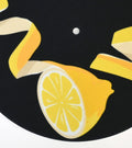 Lemon twist close up of yellow original artist design with black background
