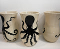 9 in tall handpainted ceramic vase with unique octopus design