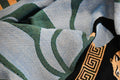Blue, black, orange, and green original Art Pattern throw blanket close up