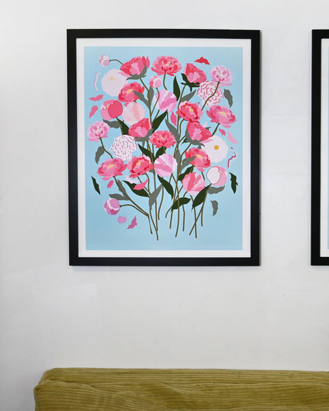 Framed art print with pink peony flowers and blue background
