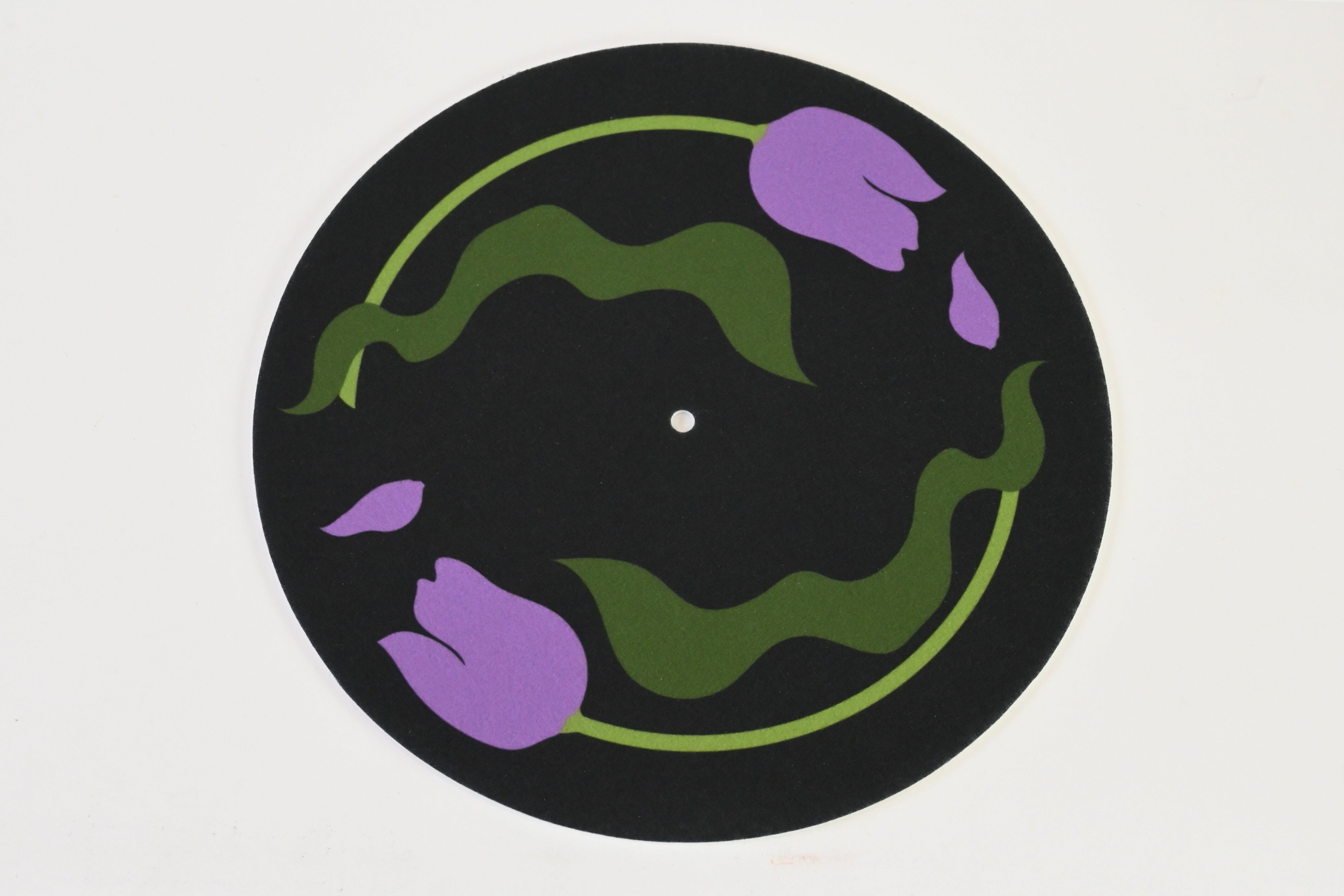 Felt turntable slipmat with yellow tulips design on a black background