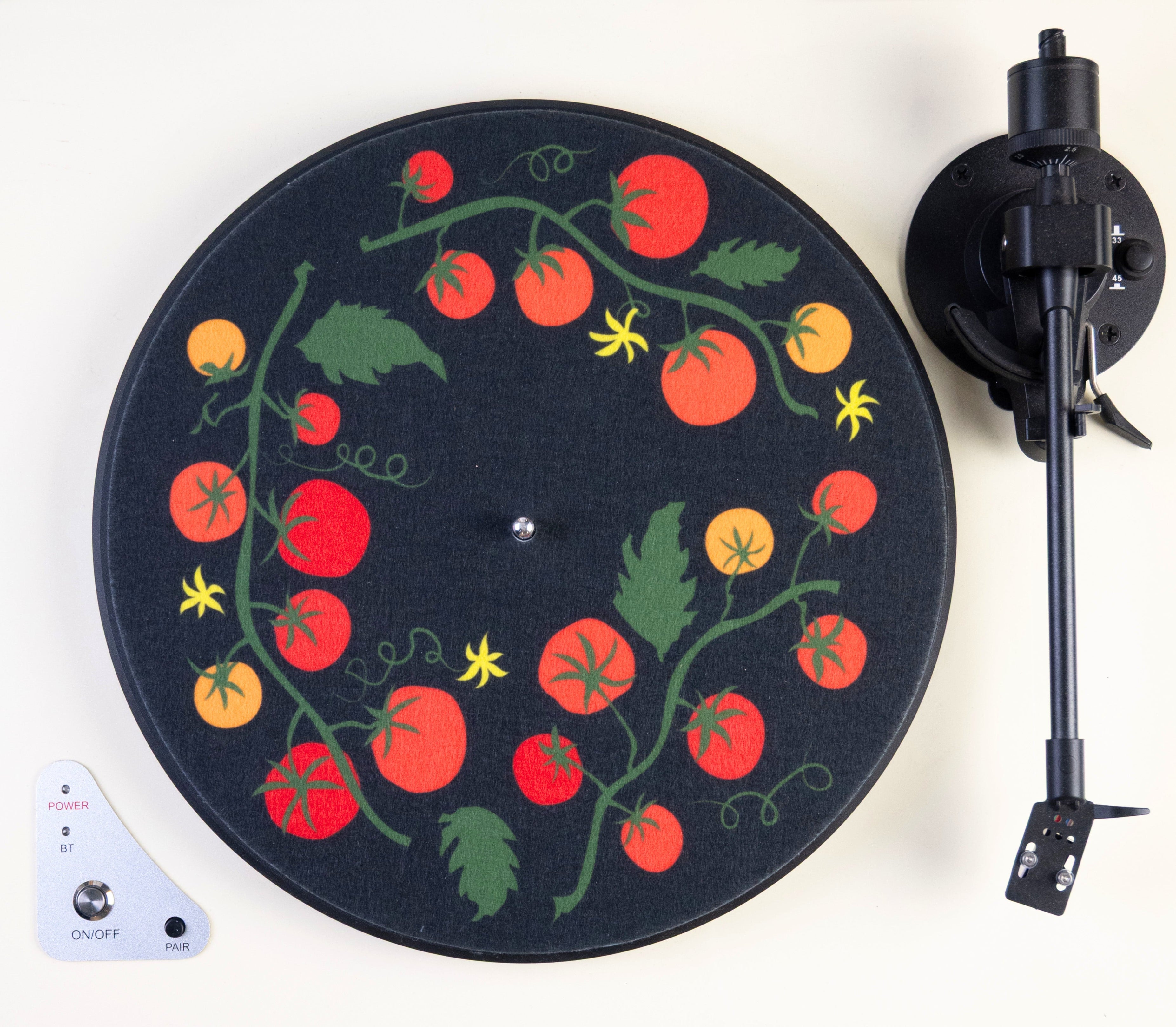 Turntable with tomato record player slipmat featuring tomatoes and leaves