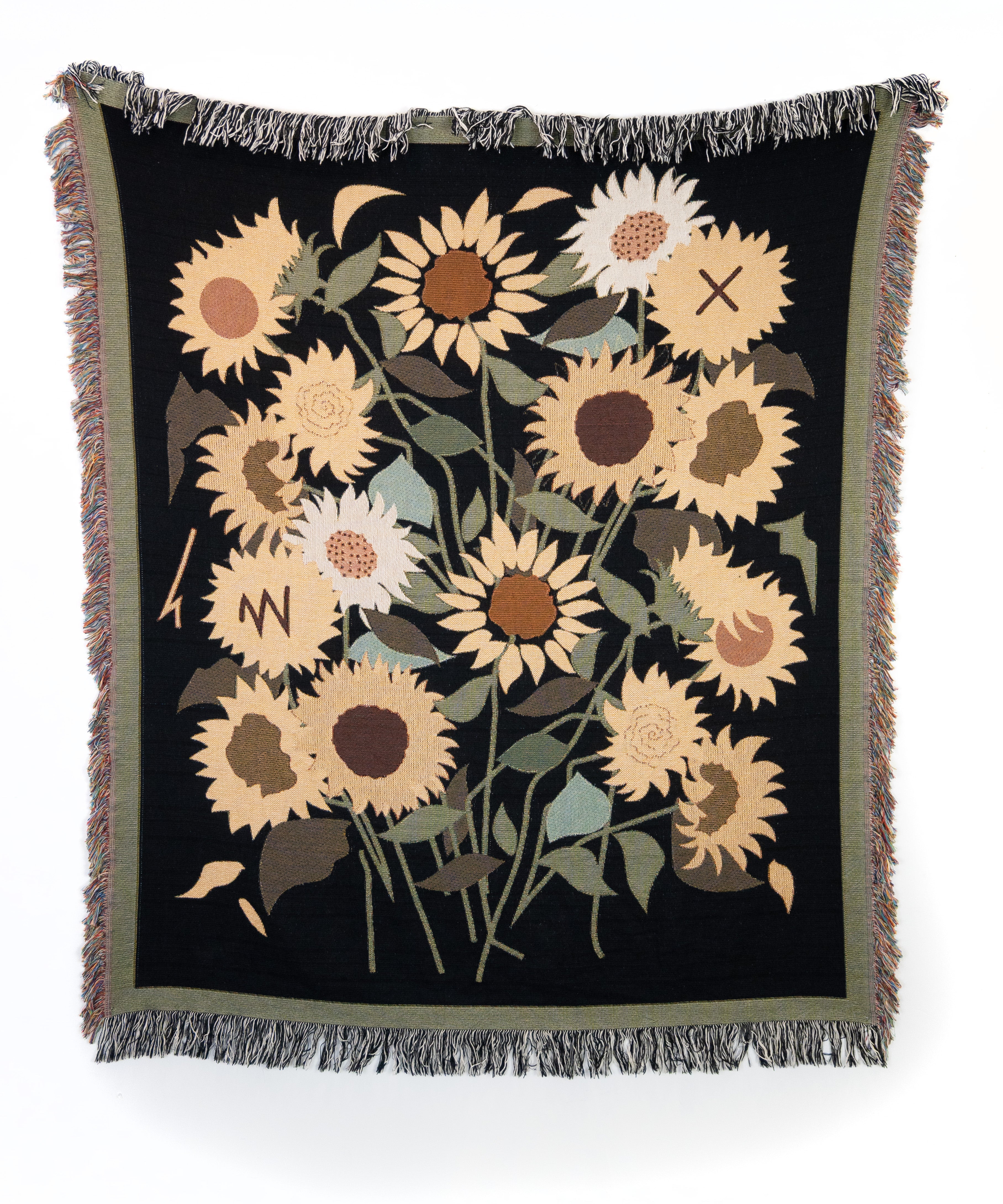 Blanket with contemporary sunflower pattern on a black background