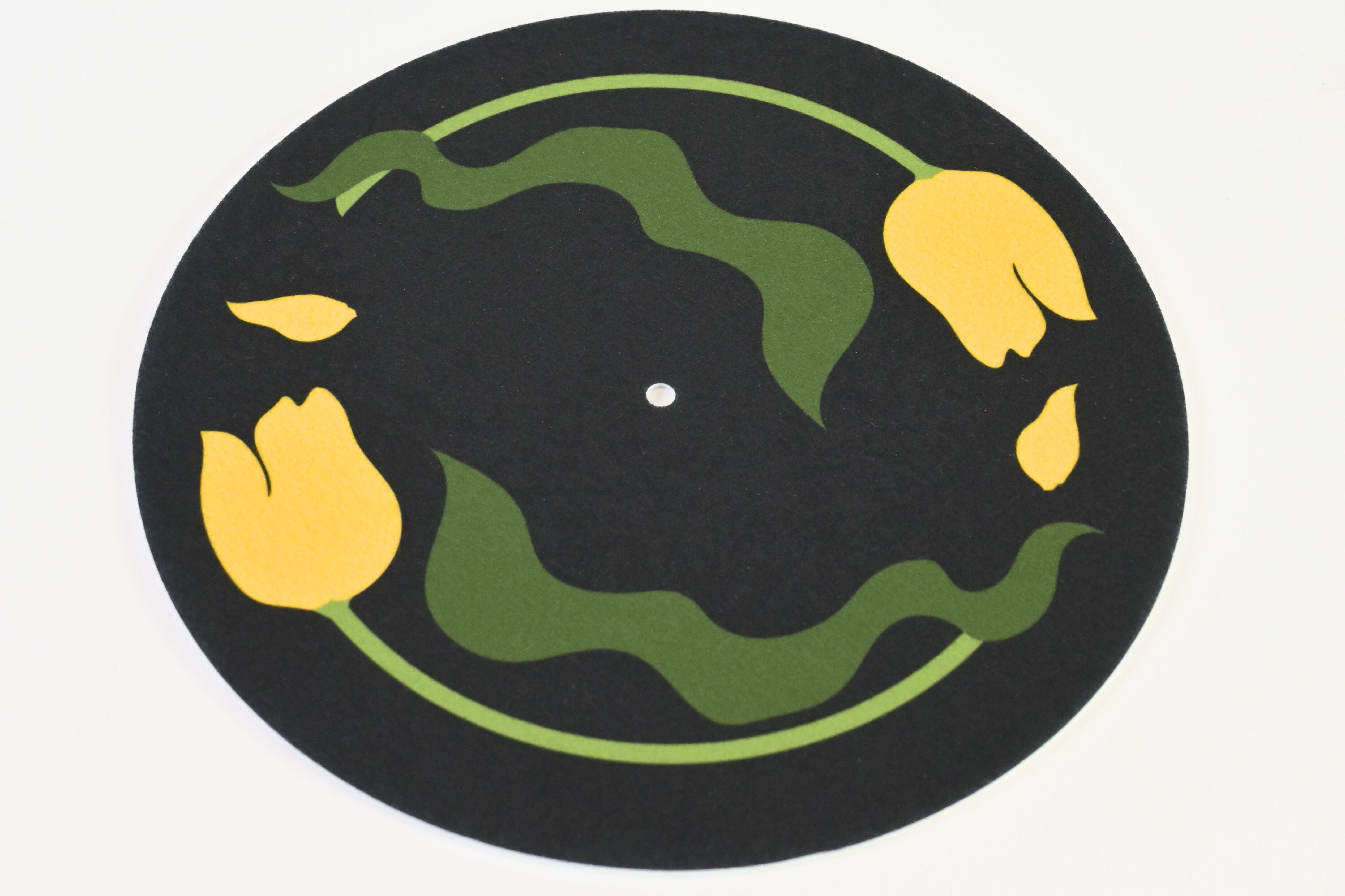 Felt turntable slipmat with yellow tulips design on a black background